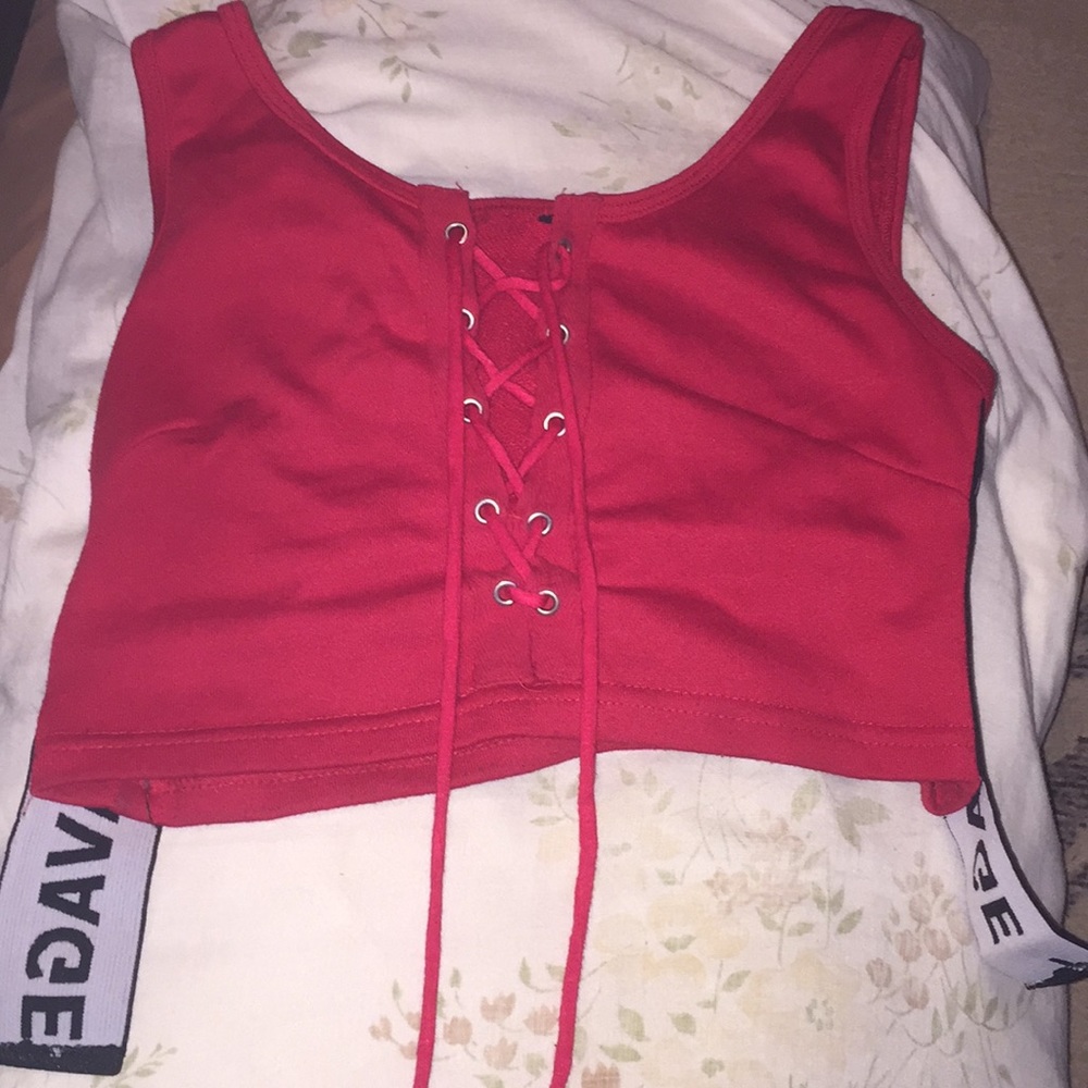 I’m selling this XS tie up SAVAGE Crop Top